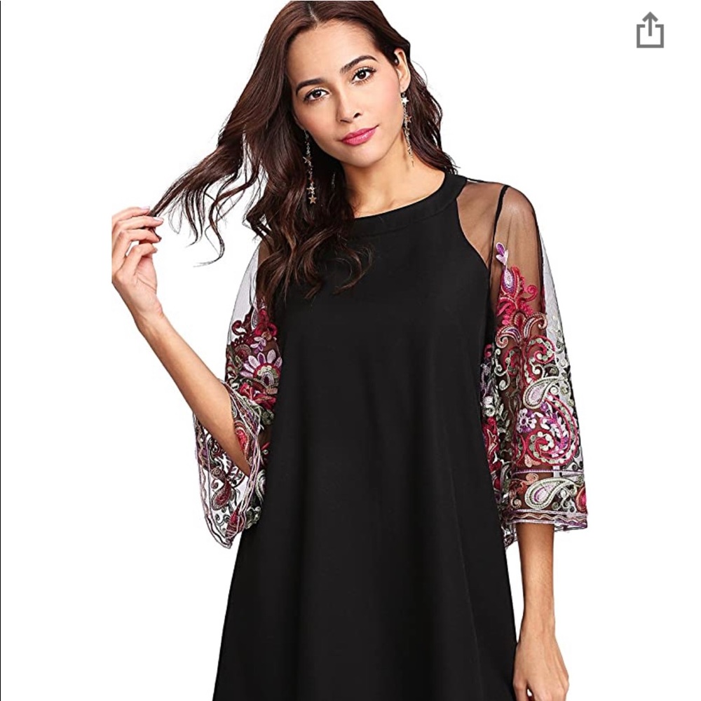 Black dress with sheer embroidered sleeves